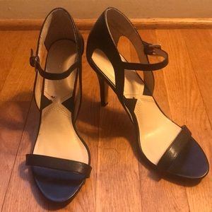 Black leather ankle strap stilettos